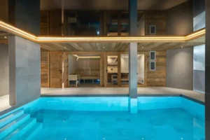 location chalet de luxe avec piscine intérieure chauffée et sauna