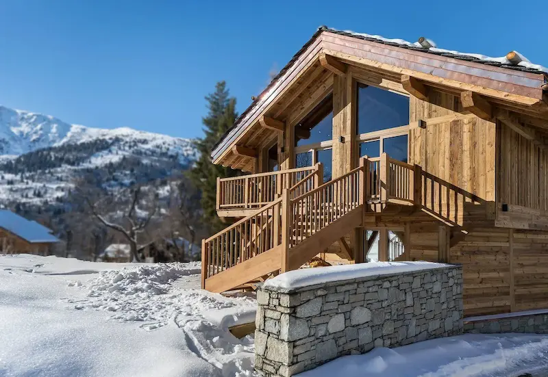 Luxury chalet rental in Méribel 1 location chalet de luxe meribel - vue extérieure du chalet Bozel en hiver