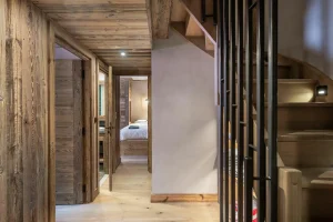 Timber corridor leading to the bedrooms, beside the staircase at Apartment Campanule in Saint-Martin-de-Belleville
