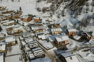 Aerial view of the hamlet and the chalets in the snow at Apartment Campanule in Saint-Martin-de-Belleville