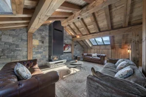 location chalet meribel salon avec cheminée