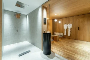 Hammam and walk-in shower in the wellness area, with bathrobes at Chalet Brigues in Courchevel Le Praz