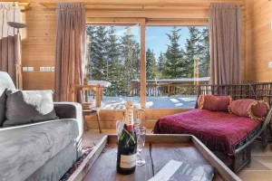 location chalet meribel - salon avec vue terrasse