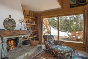 location chalet meribel - salon avec cheminée