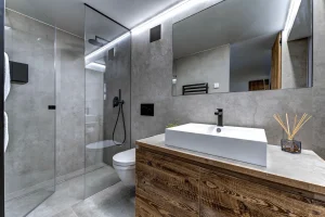 Bathroom with a rectangular basin on an oak vanity and a walk-in shower